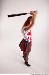 TINA STANDING POSE WITH BASEBALL BAT